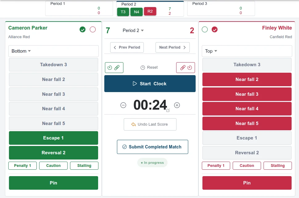 The Snapdown table-scoring screen that entered it: both wrestlers' scoring buttons, 7–2 in period 2, clock at 24 seconds